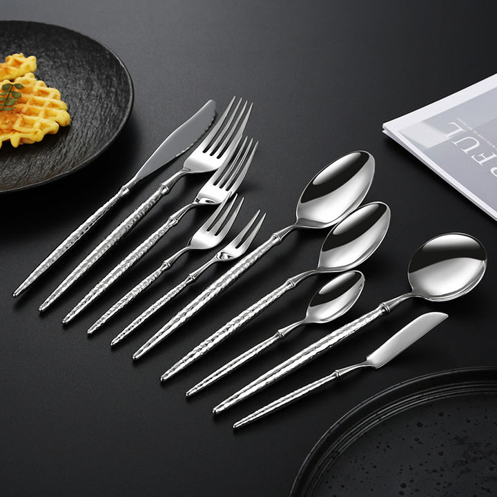 Elegant soup spoon with structured handle Kalsten