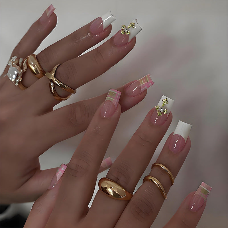 Artificial nail kit with elegant French tips and modern accents Kalsten