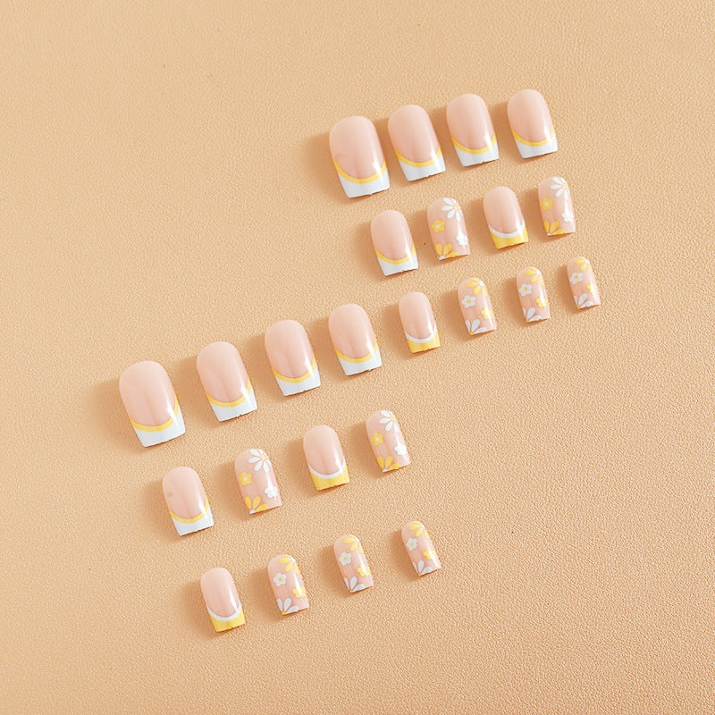 Nail art set with creative floral designs and elegant French finish Kalsten