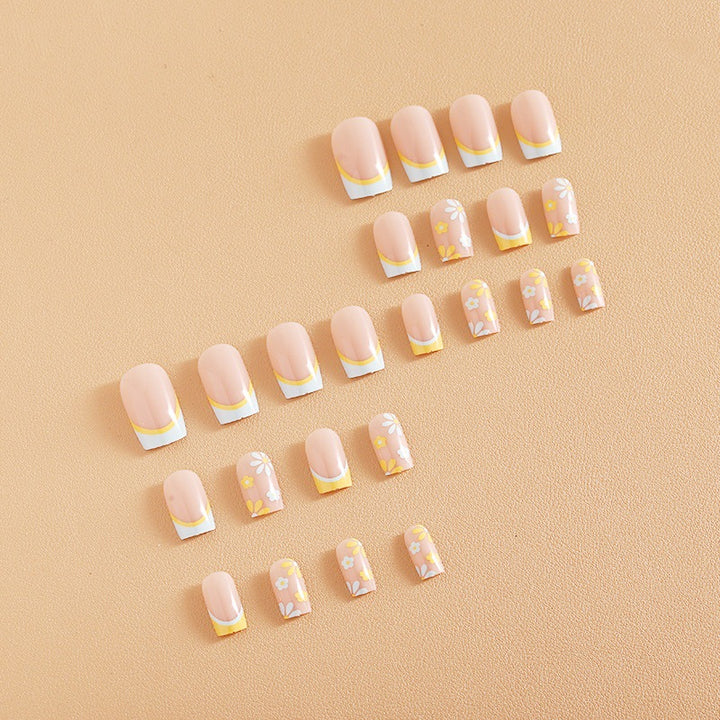 Nail art set with creative floral designs and elegant French finish Kalsten