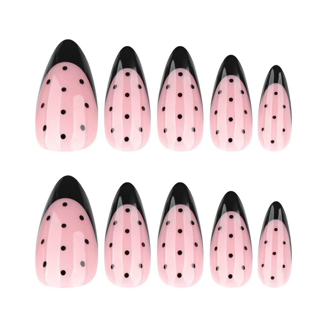 Artistic stiletto nails with black dot pattern Kalsten