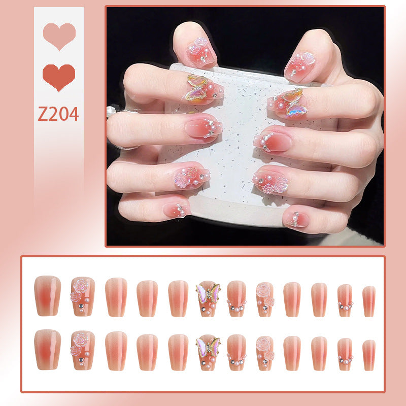 Artificial nail set with filigree 3D flowers and radiant glitter accents Kalsten