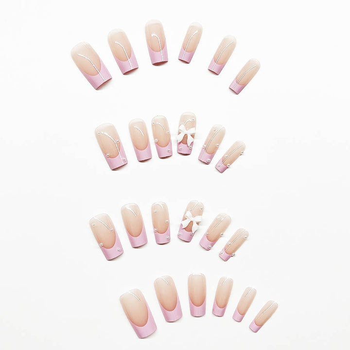 Artificial nail set with romantic bow and pearl embellishments Kalsten