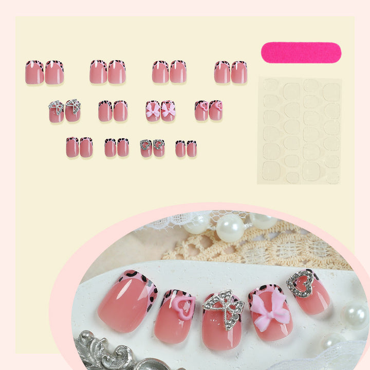 Decorative Press-On Nail Set with Artistic Bow and Heart Accents kalsten