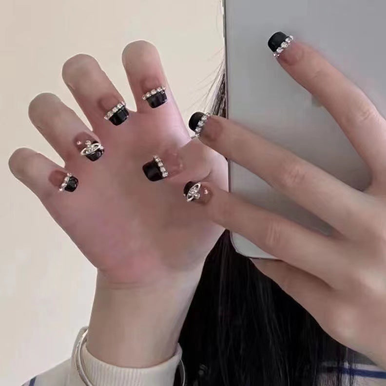 Glamorous nail art with rhinestone embellishments Kalsten