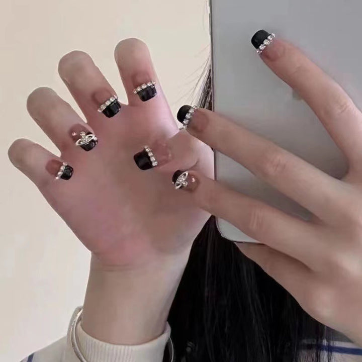 Glamorous nail art with rhinestone embellishments Kalsten