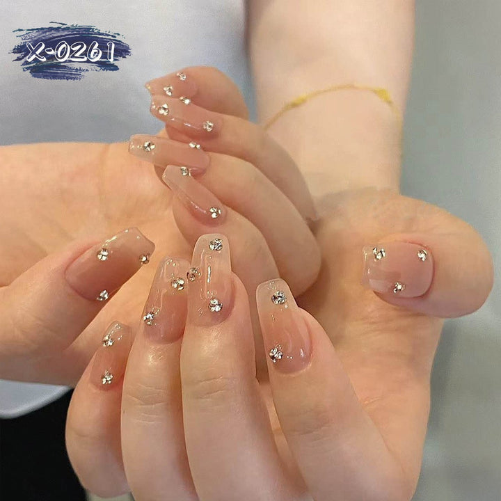 Decorative Nail Art with Rhinestone Accents