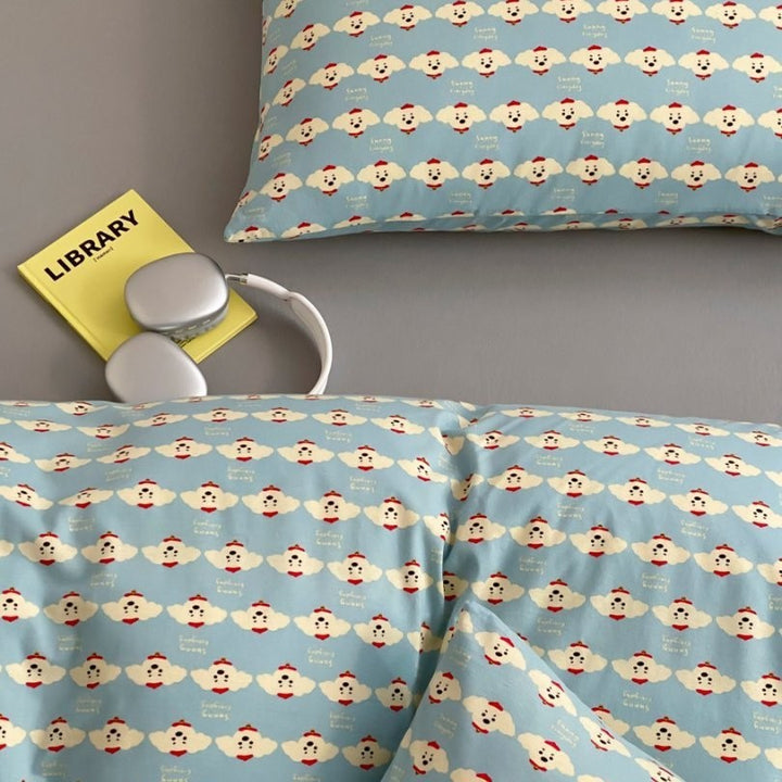 Light cotton bedding set with quilted topper and fine stripe pattern