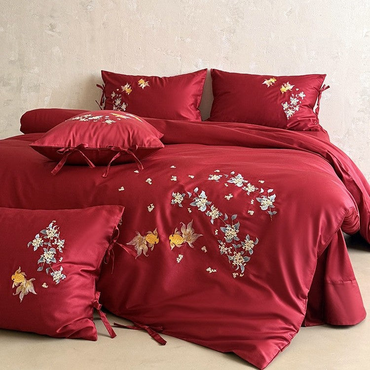 Luxurious satin bedding set with intricate floral-fish embroidery
