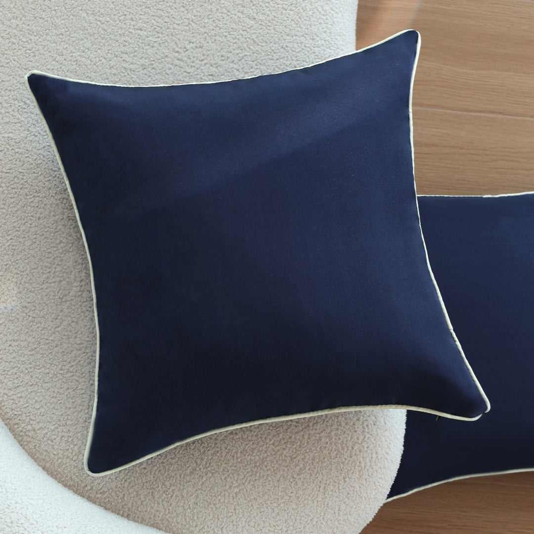 Square cushion cover with contrasting piping and microvelours surface Kalsten