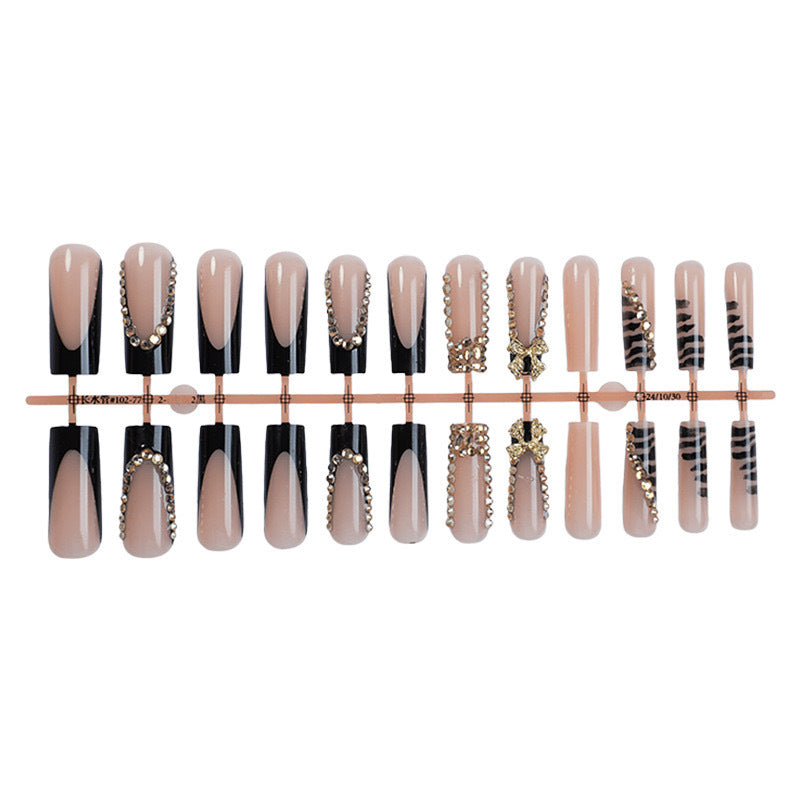 Acrylic nail set with glamorous 3D bows and radiant rhinestone decorations Kalsten