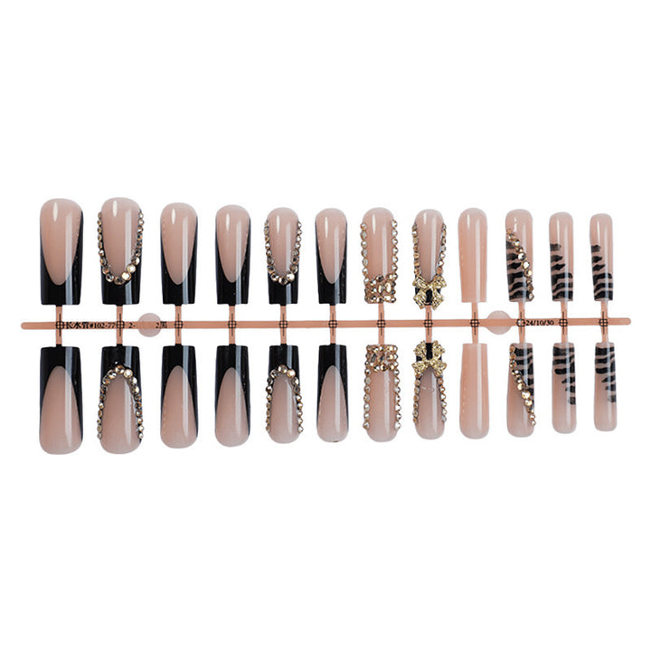 Acrylic nail set with glamorous 3D bows and radiant rhinestone decorations Kalsten