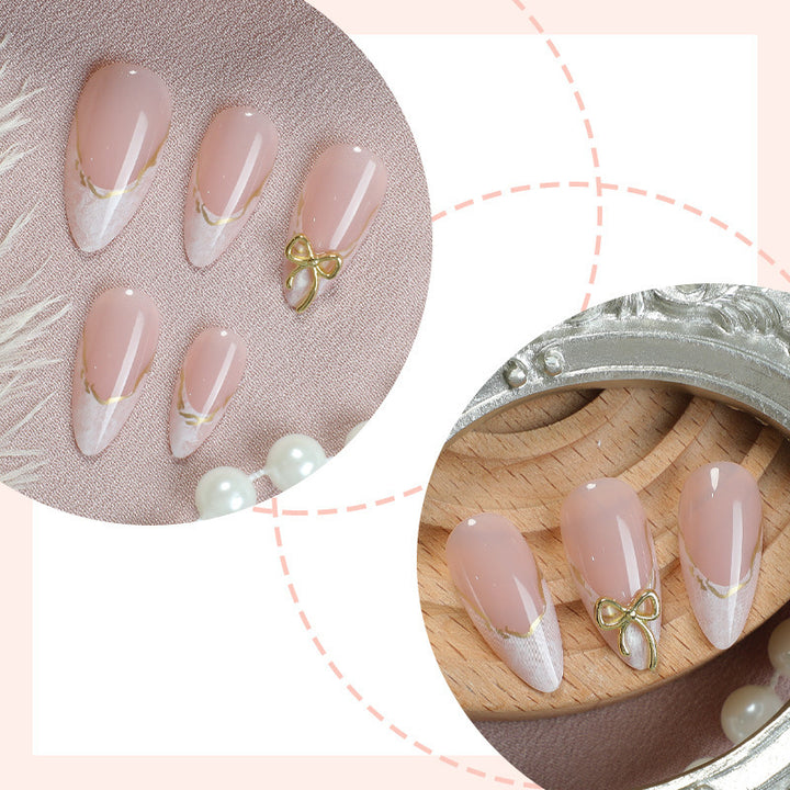 Artistic Nail Tips with Golden Accents Kalsten