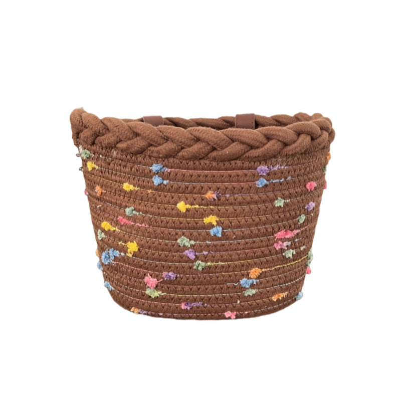 braided rope bike basket with pom pom embellishments and leather handlebar straps Kalsten