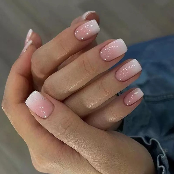 Acrylic nail set with elegant ombre design and glitter accents Kalsten