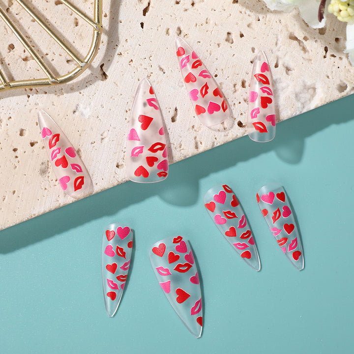 Artificial nails with romantic lip and heart designs Kalsten
