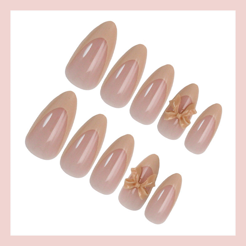 Artificial nail set with elegant tips and romantic bow decorations Kalsten