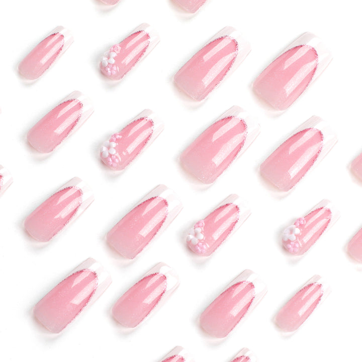 Artful Nail Extensions with Glitter and Flower Accents Kalsten