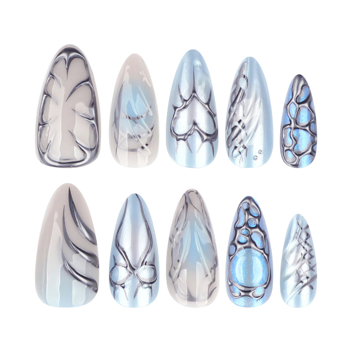 Artful stiletto nails with playful metallic details Kalsten