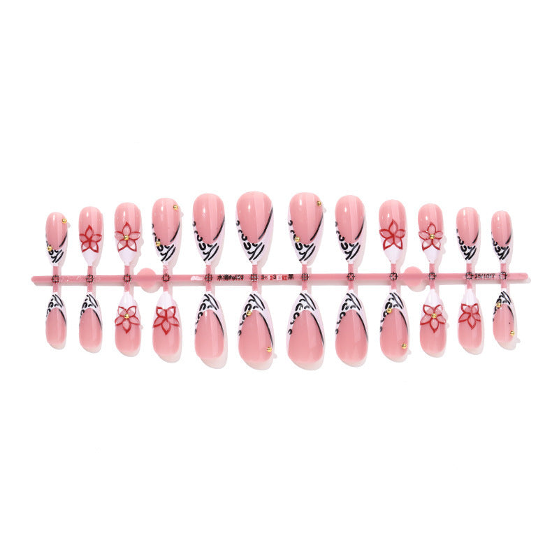 Artificial nail set with elegant ribbon and flower embellishments Kalsten