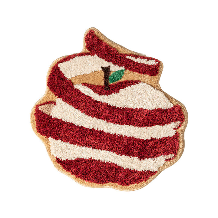 Hand-tufted decorative doormat in apple shape made of cotton blend with non-slip bottom Kalsten