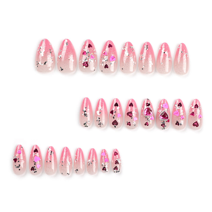 Artful nail art with playful heart designs and glitter Kalsten