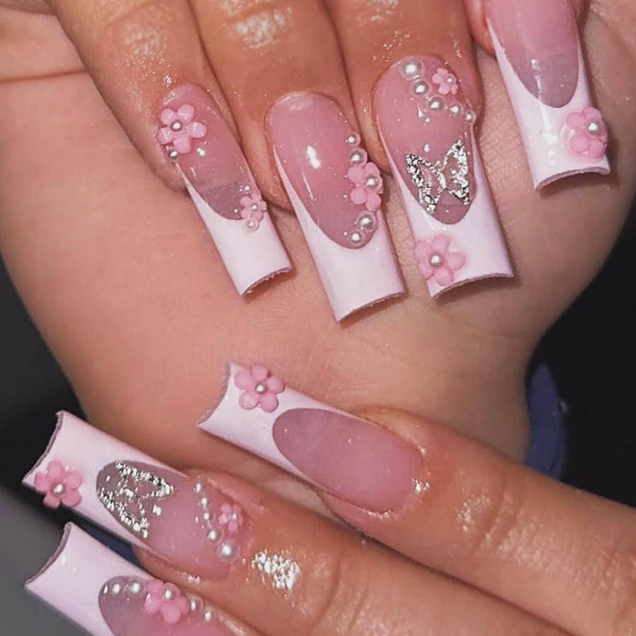 Artificial nail set with playful 3D flowers and glitter accents Kalsten