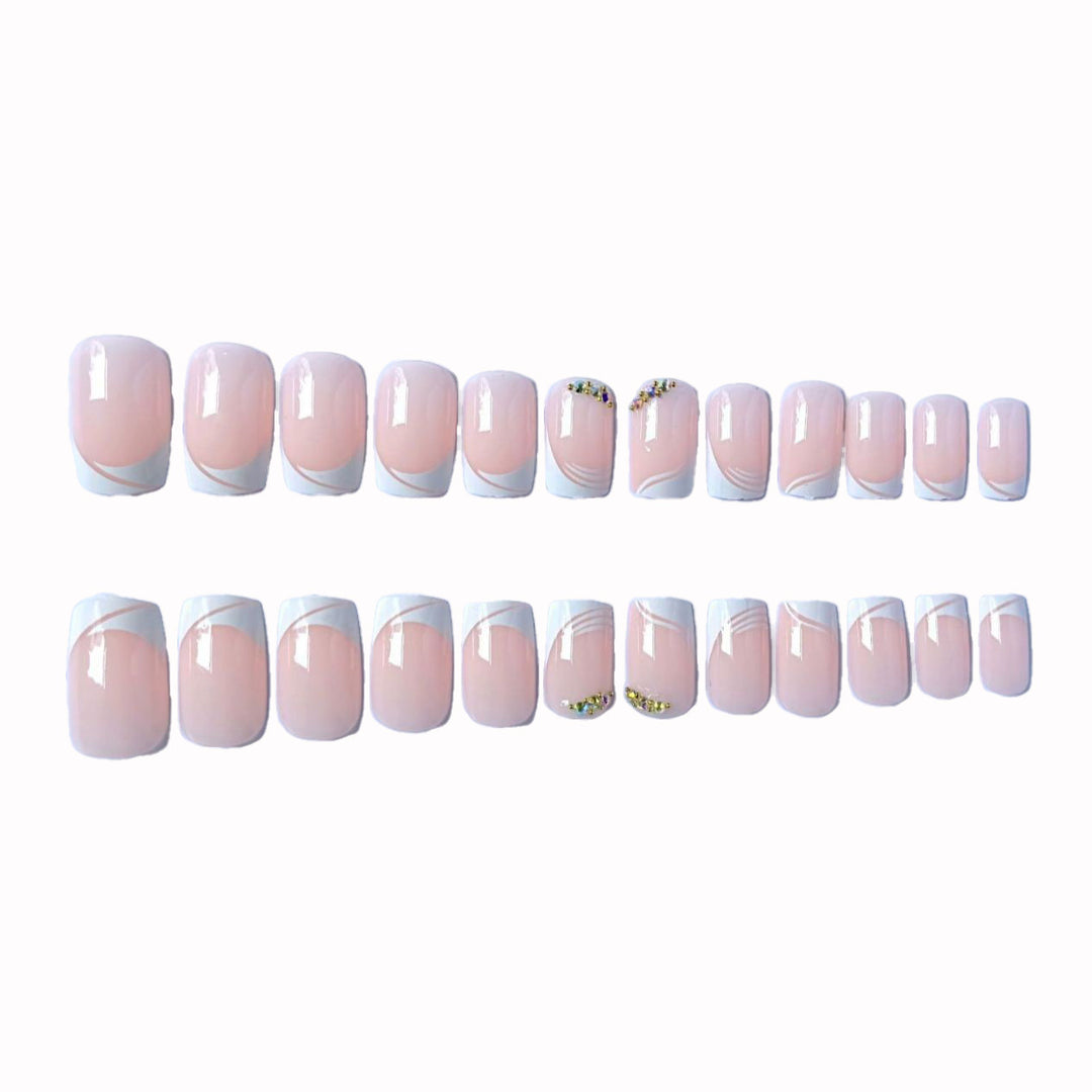 Elegant French Tip Press-On Nails with Gem Accents