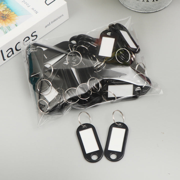 Unisex writable keychain with clear labeling field Kalsten