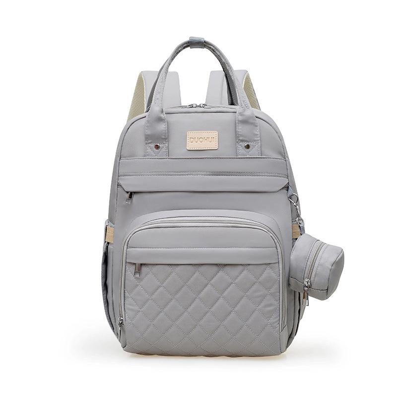 Versatile Quilted Backpack with Handy Side Pouch Kalsten