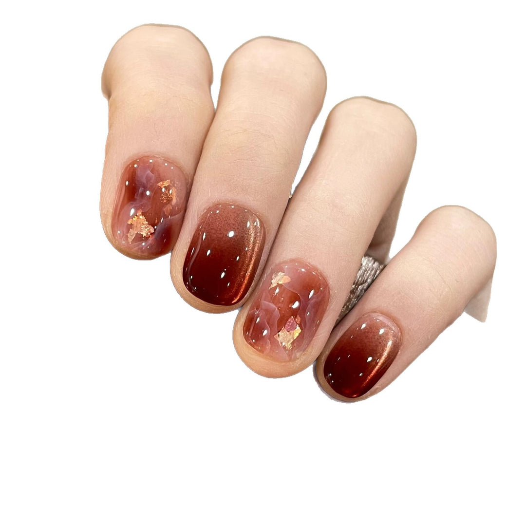 Artificial nails with elegant gradient and golden accents Kalsten