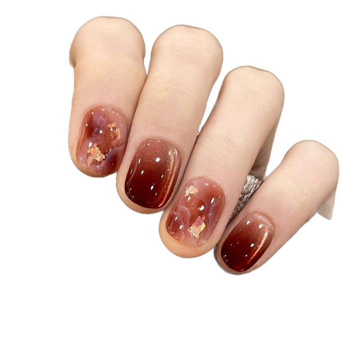 Artificial nails with elegant gradient and golden accents Kalsten