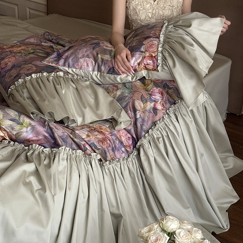 Bedding set made of cotton satin with lavish frills and floral watercolor print