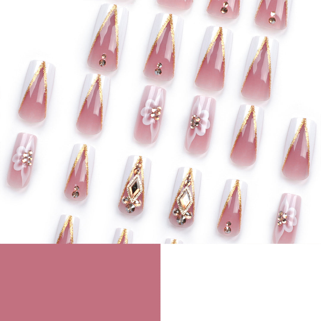Artistic nail extensions with floral and glitter accents Kalsten