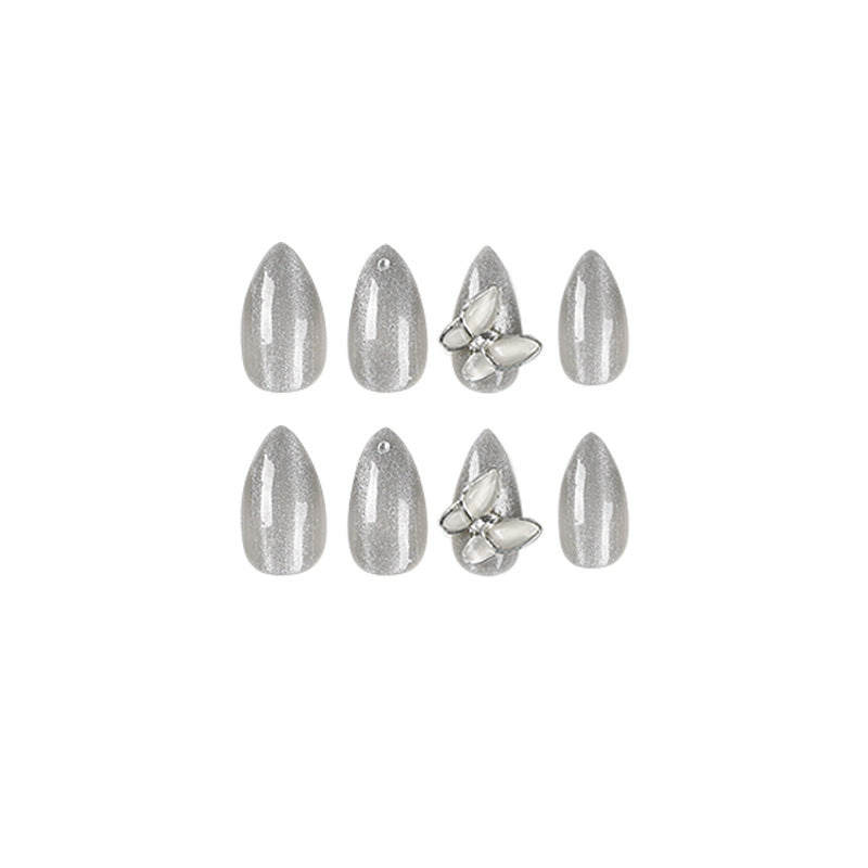 Glamorous stiletto nails with radiant glitter and elegant 3D design Kalsten