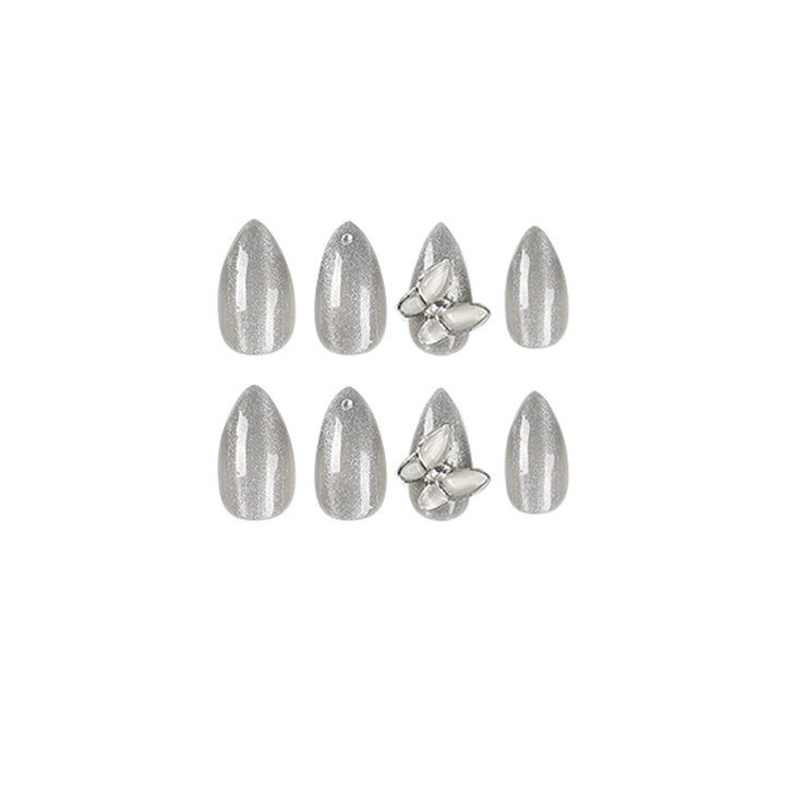 Glamorous stiletto nails with radiant glitter and elegant 3D design Kalsten