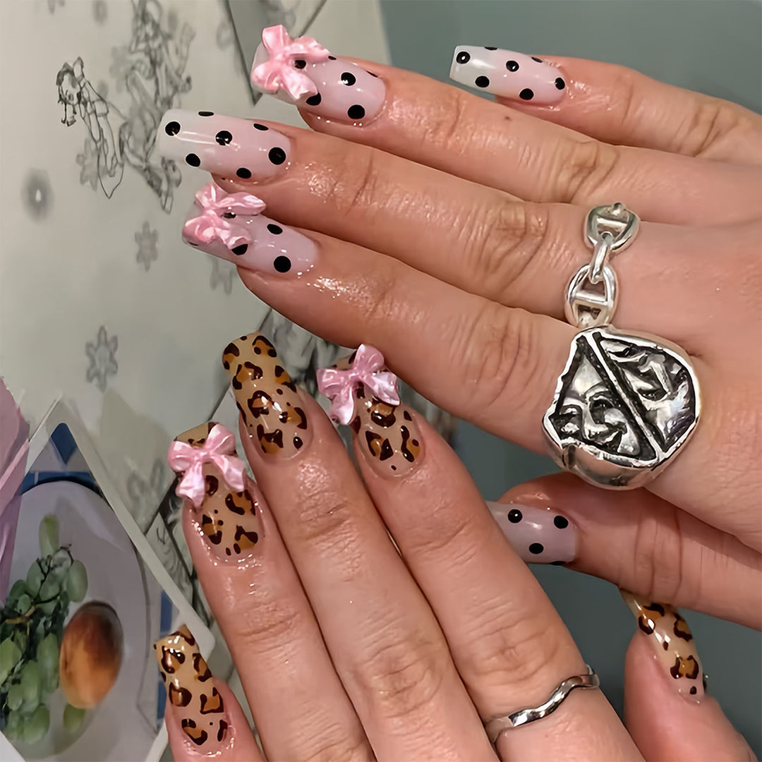 Creative artificial nails with bows and dots Kalsten