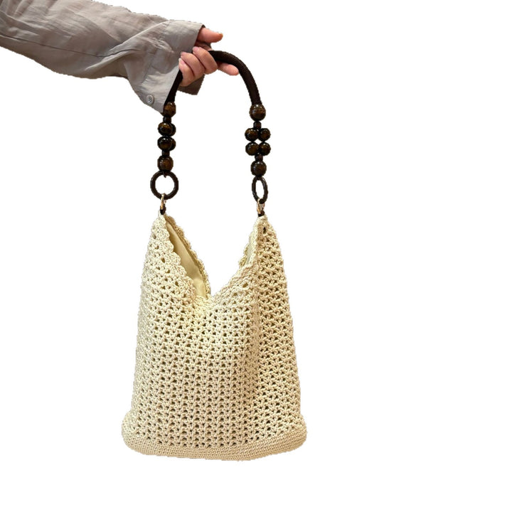 Hand-knotted bucket bag with wooden handles Kalsten