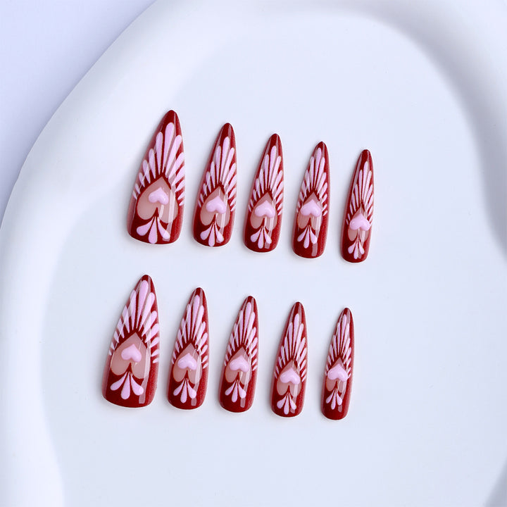 Artificial nails with playful heart design and elegant accents Kalsten