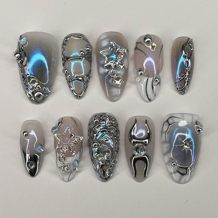 Artful Nail Extensions with Shiny Metal Accents Kalsten