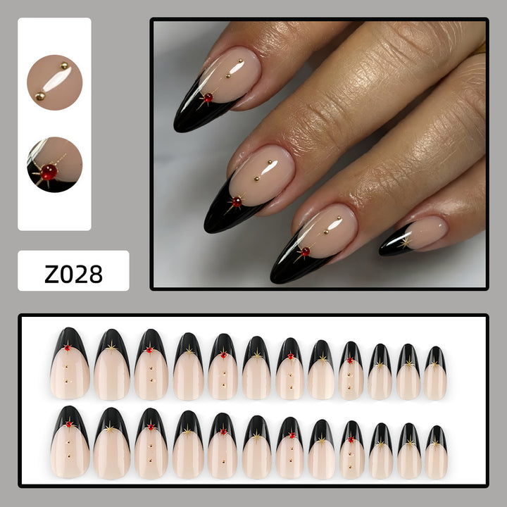 Glamorous artificial nails in stylish stiletto design with golden accents Kalsten