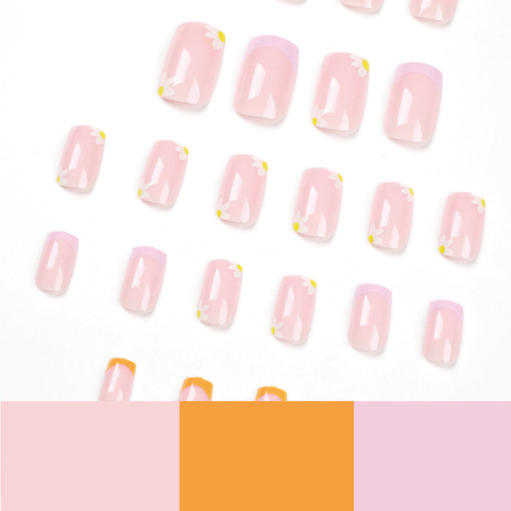 Artistic acrylic nails with floral design and creative color accents Kalsten
