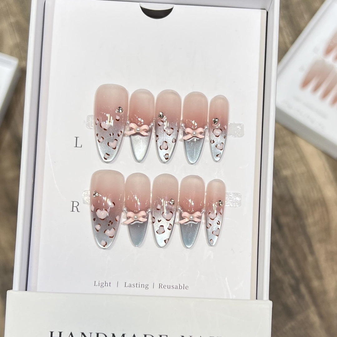 Decorative Press-On Nail Design with Bow Accents Kalsten