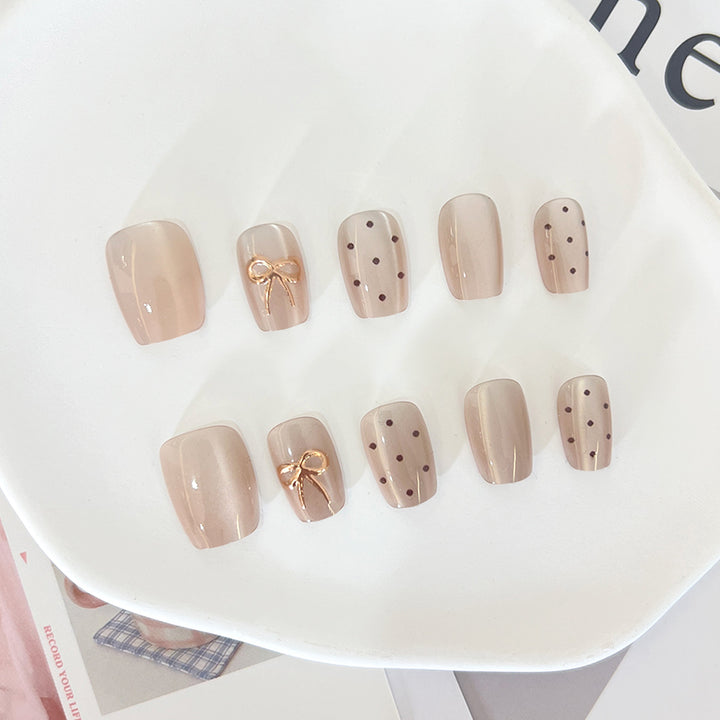 Artificial nail tips with elegant bow designs Kalsten