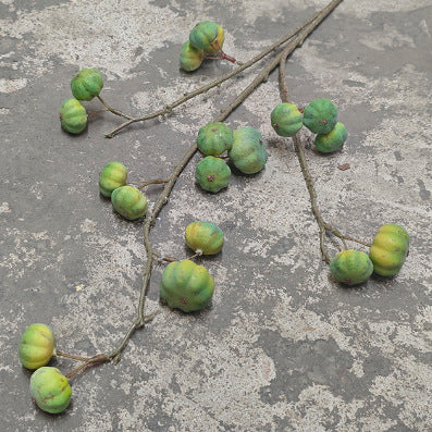 Artificial decorative branch with dried-looking pumpkin balls and flexible wire stem