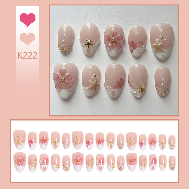 Artificial nail set with floral and maritime designs Kalsten