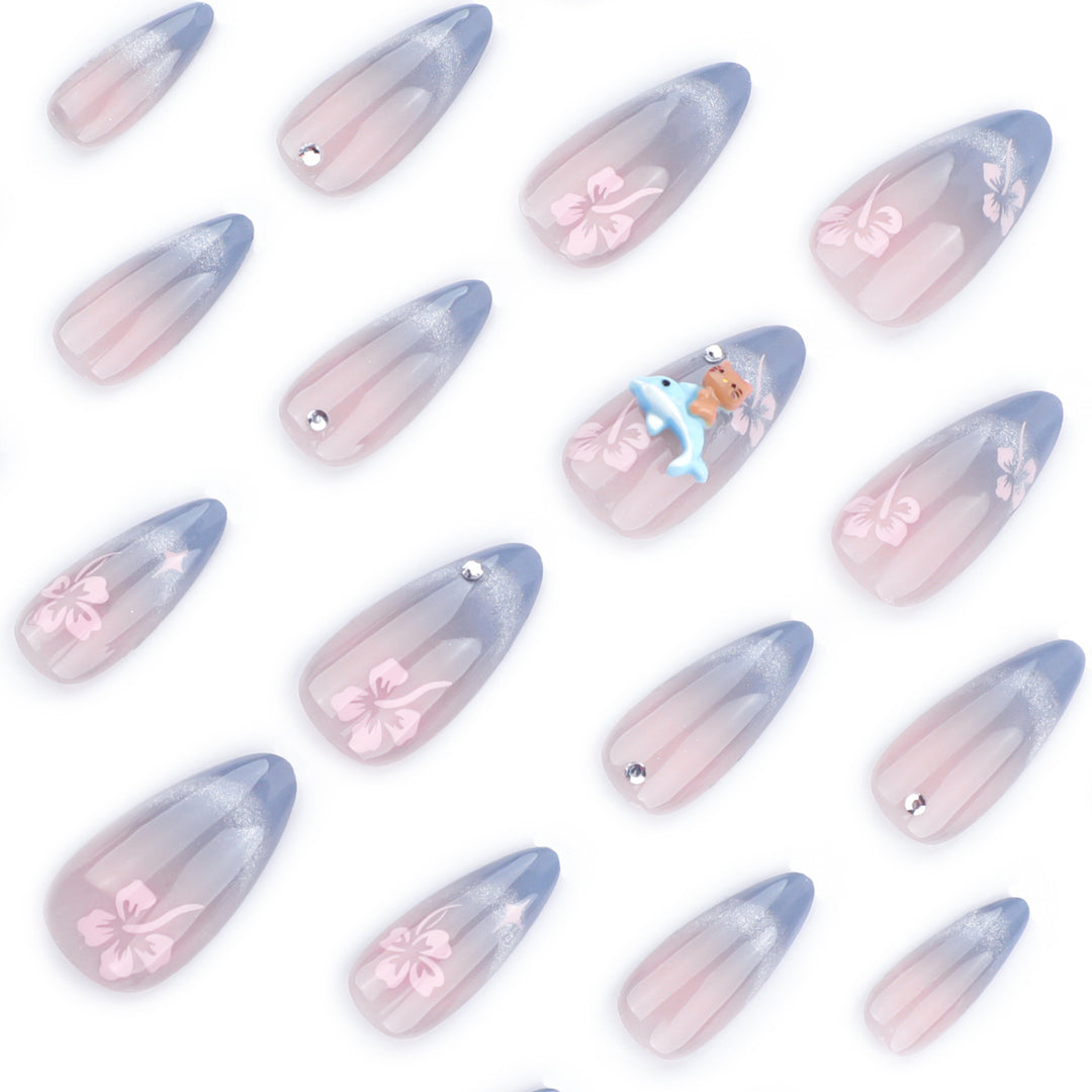 Artful nail extensions with elegant ombré design and floral accents Kalsten