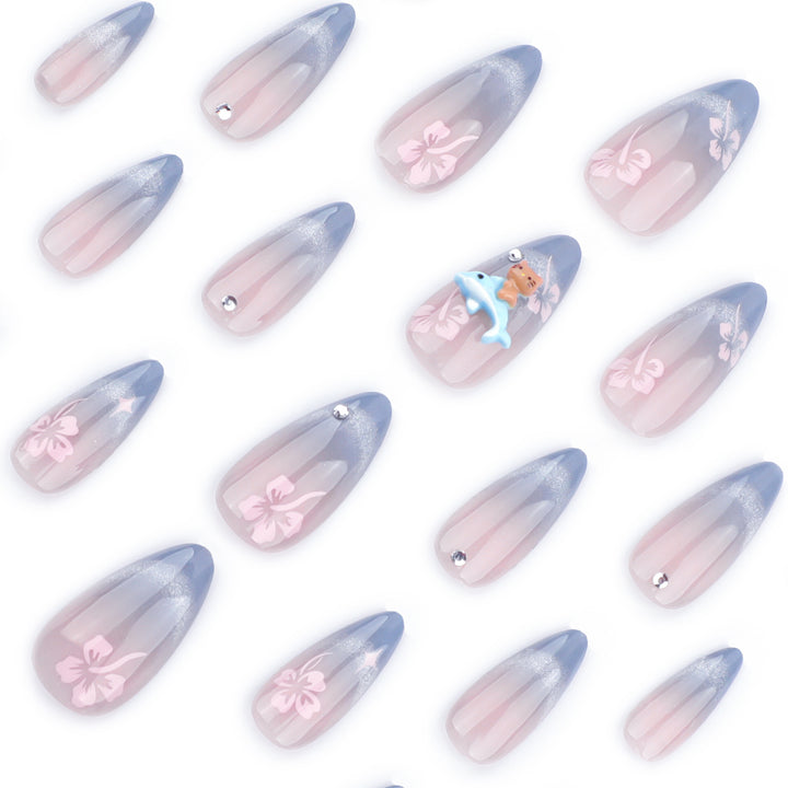 Artful nail extensions with elegant ombré design and floral accents Kalsten