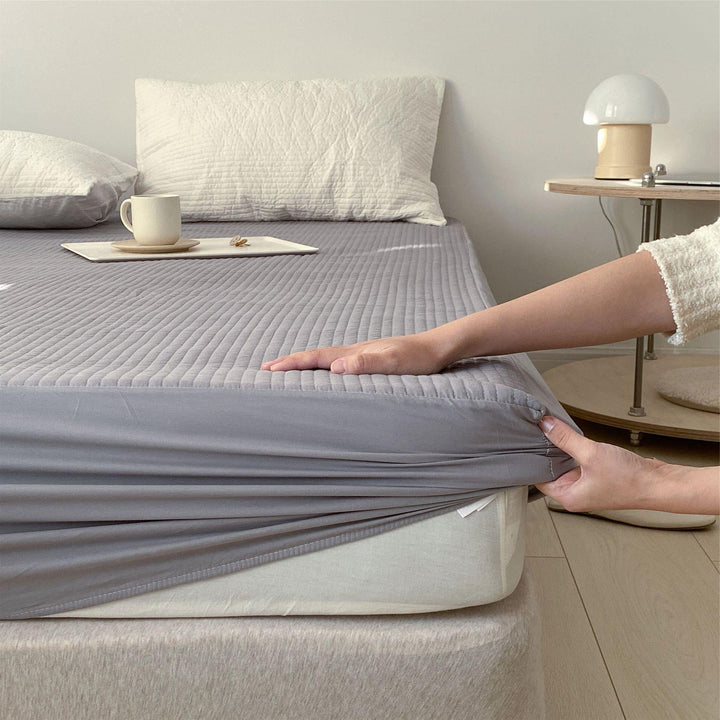 Quilted mattress topper fitted sheet with elastic all-around rubber