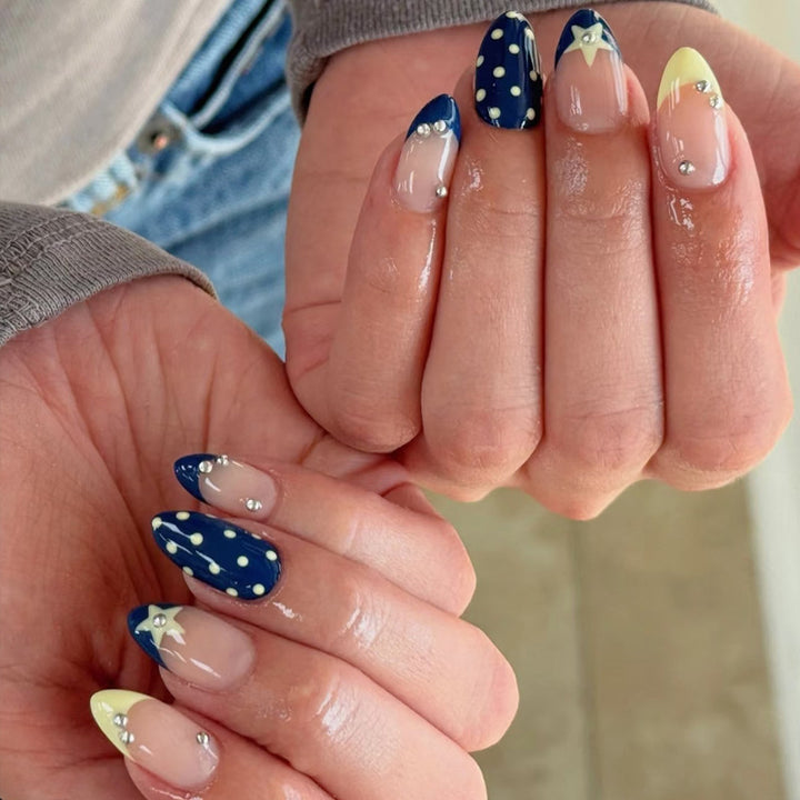 Artistic Nail Design with Star and Polka Dot Accents Kalsten